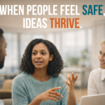 Team members engaged in an open workplace discussion where ideas are shared in a psychologically safe environment