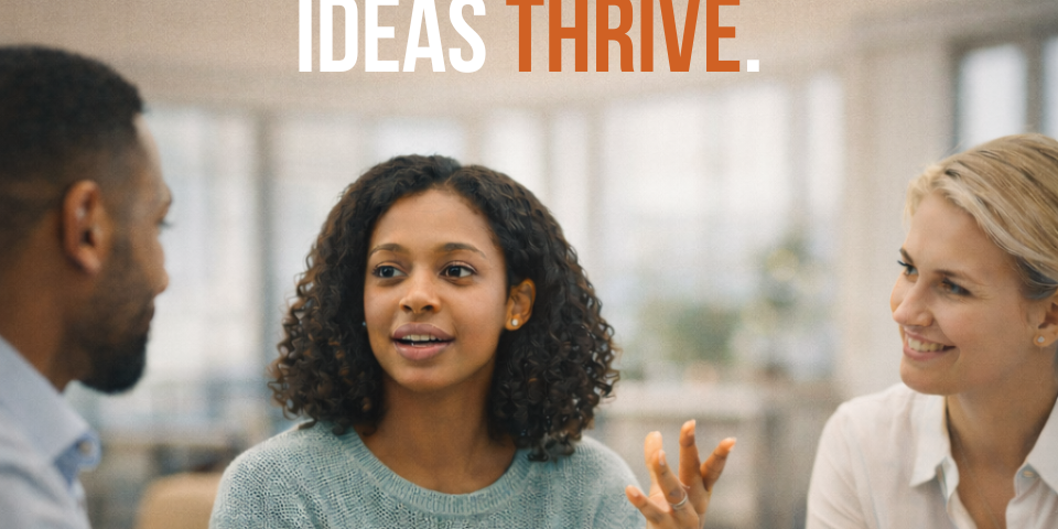 Team members engaged in an open workplace discussion where ideas are shared in a psychologically safe environment