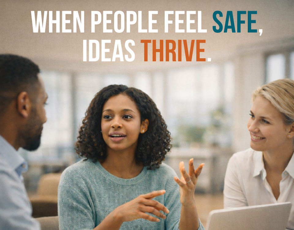 Team members engaged in an open workplace discussion where ideas are shared in a psychologically safe environment