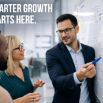 Smiling business professionals collaborating at a whiteboard to plan growth using project-based staffing strategies