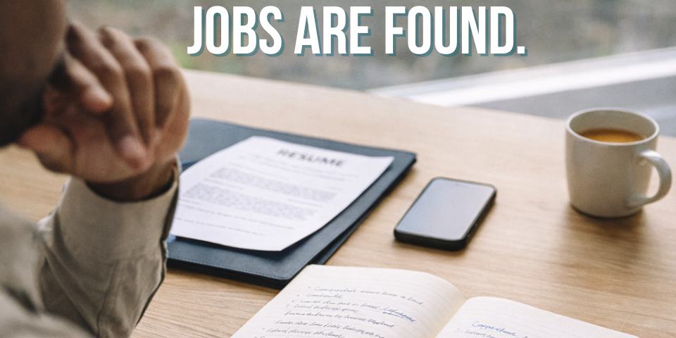 Person reviewing a resume and career notes at a desk, representing the difference between a job search and a career strategy.