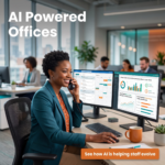 Smiling woman on phone at desk with two monitors displaying AI-powered dashboards in a modern office.