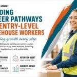 Michigan warehouse worker receiving training on inventory management system
